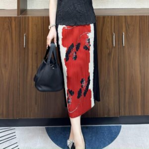 Jia Ning's new age reducing and slimming look, plus size loose and fashionable mid to long style, high waist, elastic waist, leaf color blocked half skirt