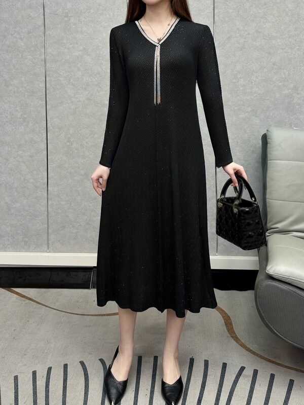 The Middle East Ramadan is a popular starry bronzing chain tassel dragon scale dress temperament